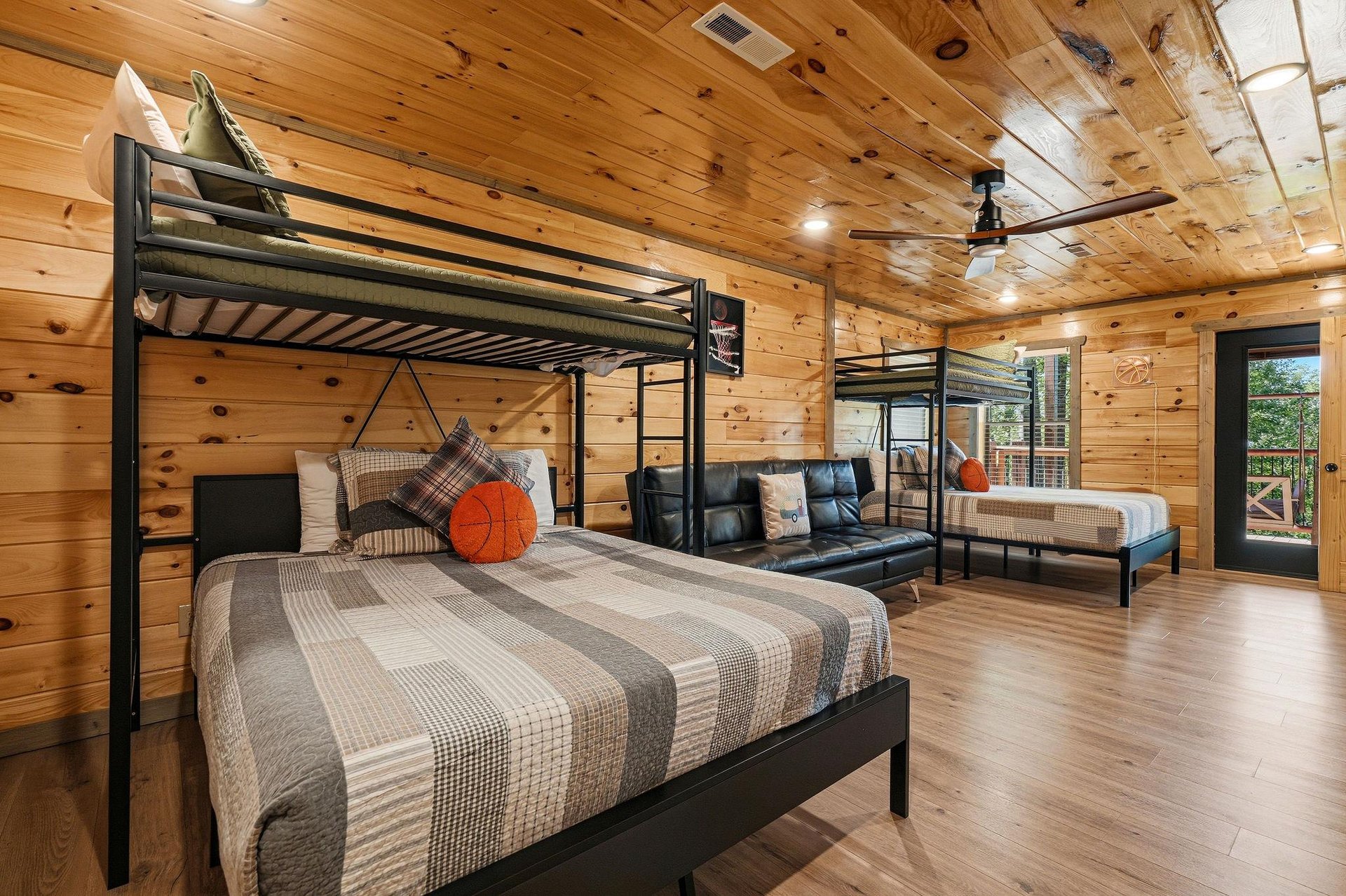 Unwind in this rustic cabin bedroom where warm wood surrounds you and bunk beds offer cozy sleeping for the whole family.