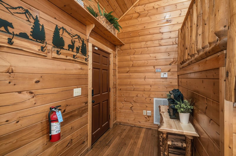 Step into your welcoming log cabin entryway where rustic charm meets modern comfort.