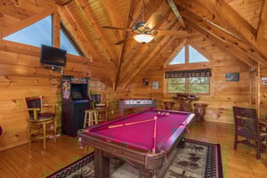 Pool table in the game loft at Graceland, a 4bedroom cabin rental located in Pigeon Forge