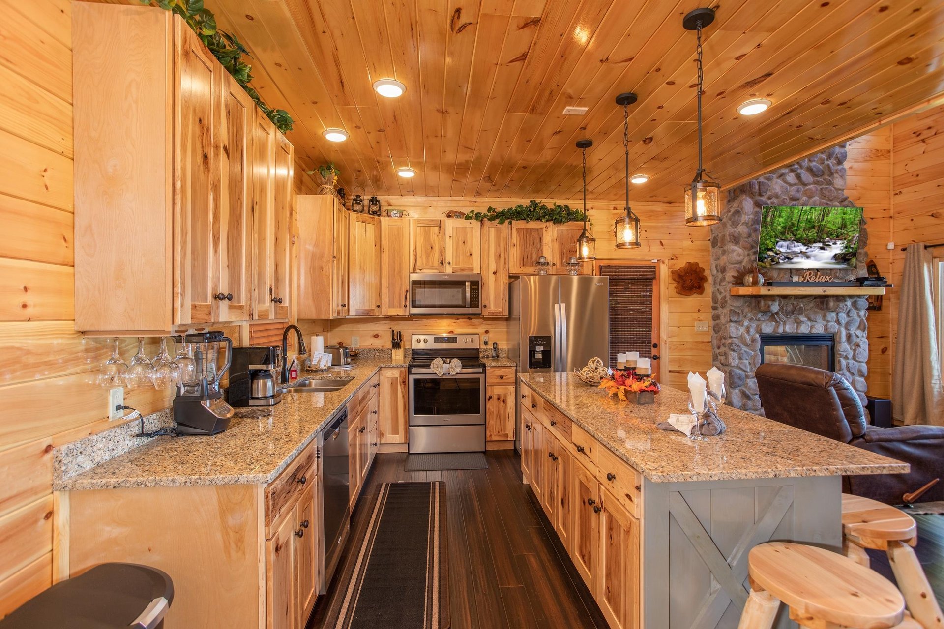 Full kitchen with appliances and island