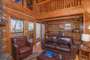 Loveseat and recliner at EllaVation, a 3 bedroom cabin rental located in Gatlinburg