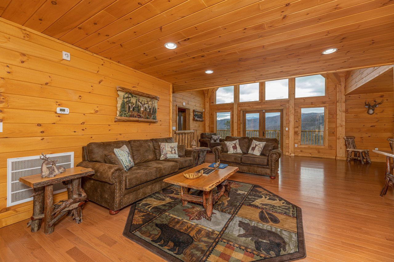 Sofa, loveseat, and coffee table at Js Hideaway, a 4 bedroom cabin rental located in Pigeon Forge