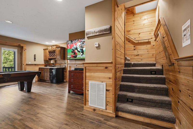 Your private entertainment haven awaits with a pool table for friendly competition, fully equipped kitchen, and large TV for game nights together.