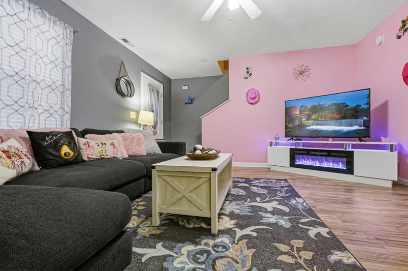 Settle into your cozy living room, where soft furnishings meet thoughtful touches—perfect for unwinding after a day of adventure.