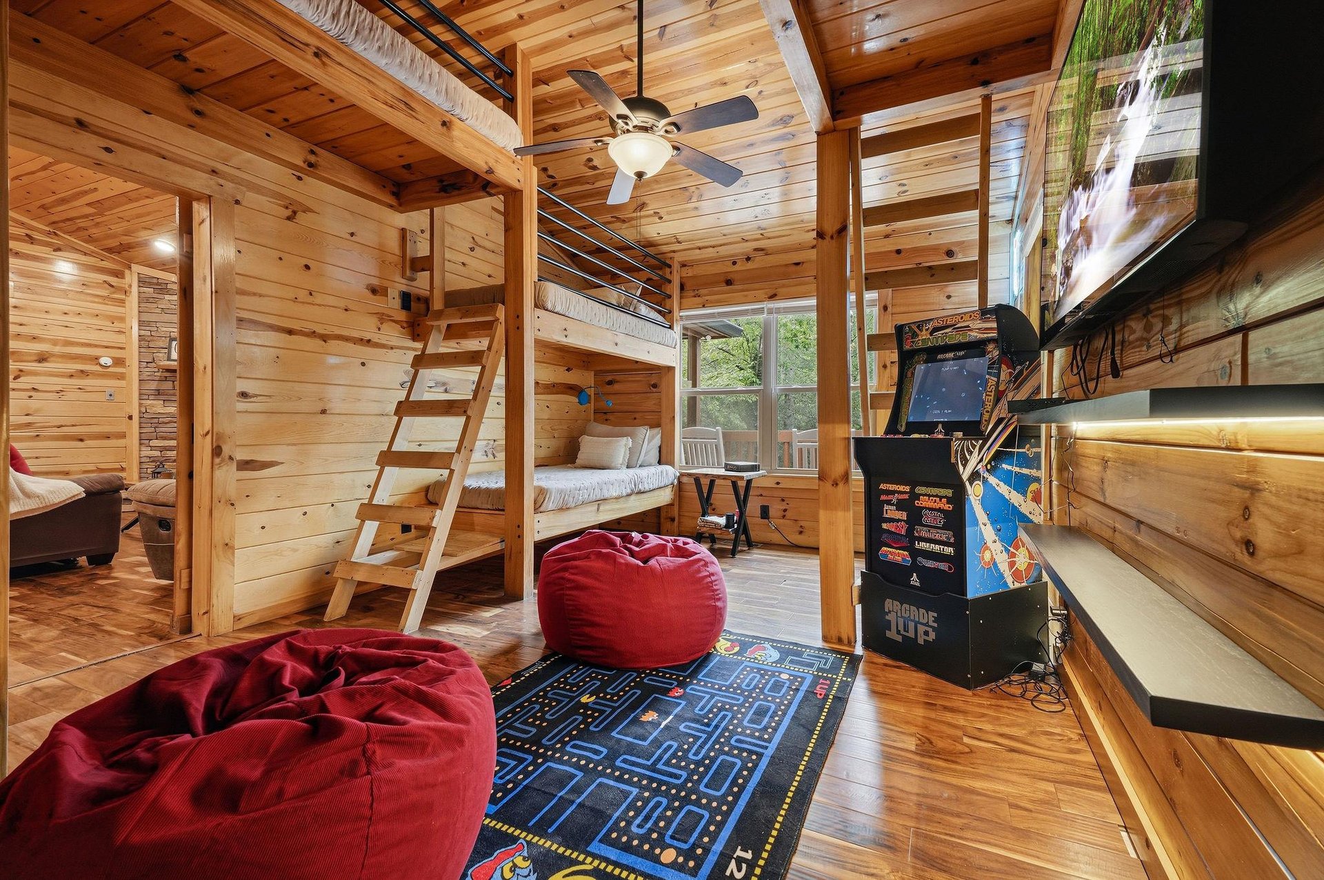 Sink into the plush bean bags in your own game room retreat. Woodpaneled walls keep the mountain vibe alive while the arcade brings out everyones playful side—just one of the special touches that ma