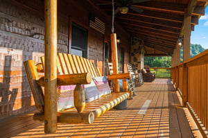 Imagine yourself relaxing on this rustic porch swing, sipping your morning coffee as gentle mountain breezes and dappled sunlight surround you. Pure serenity awaits.