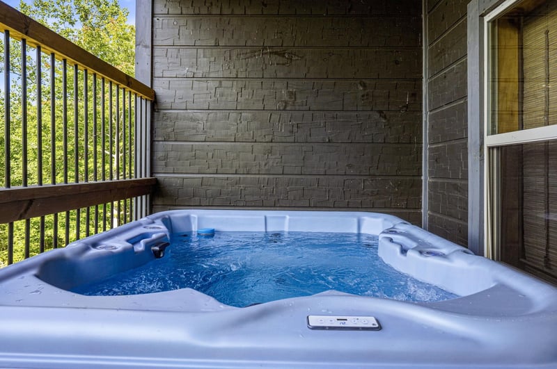 Step onto your private balcony and sink into the warm bubbling waters of your own hot tub, surrounded by lush greenery and the peaceful sounds of nature.