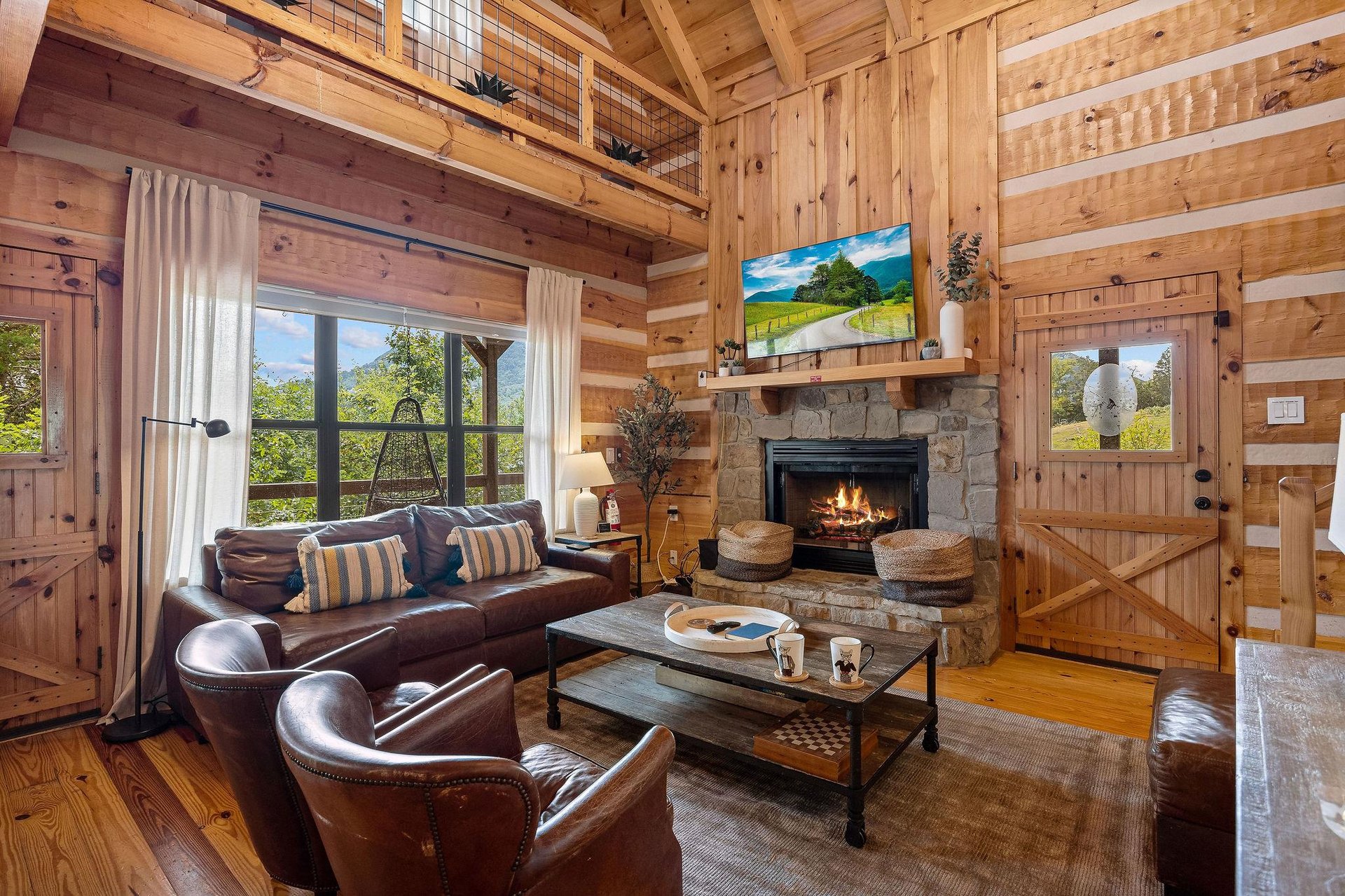 Living room with stone fireplace