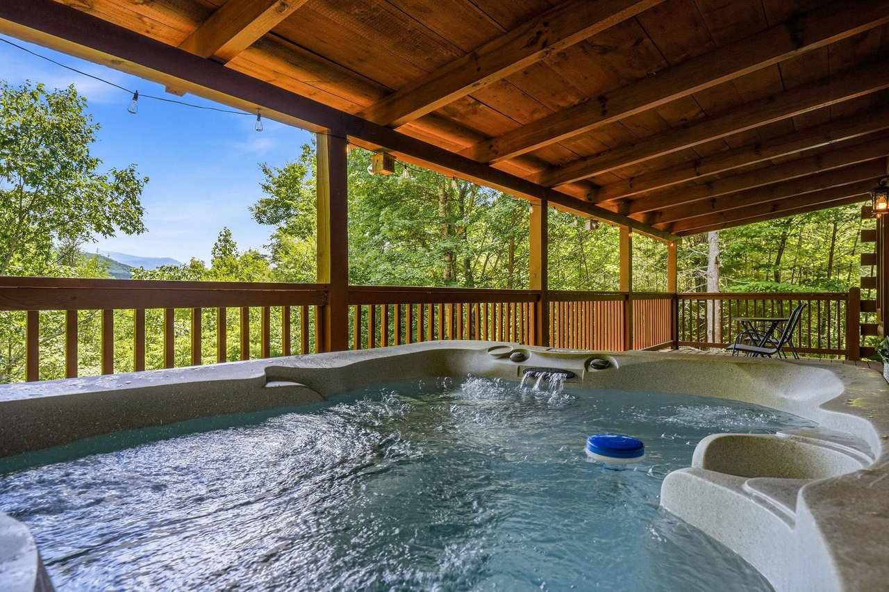 Soak away your cares in your private hot tub overlooking lush mountain forests. Warm waters, cool mountain breezes, and stunning views create the perfect backdrop for total relaxation.