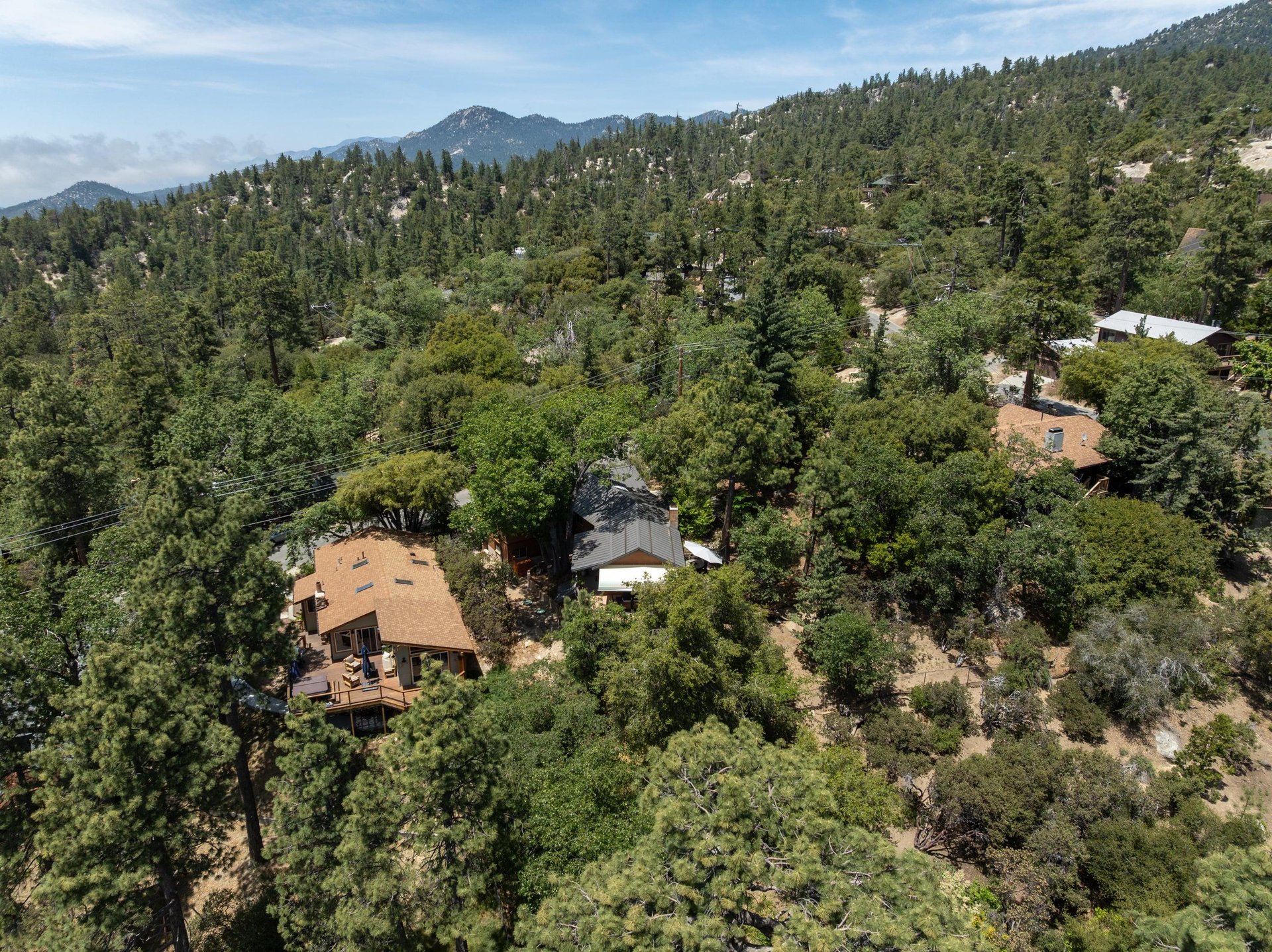 Nestled in the trees, mountain views.