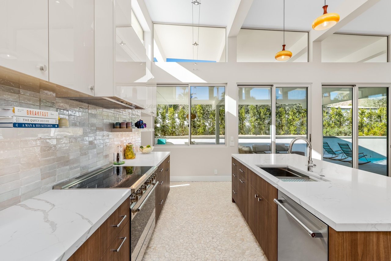 What a view from the kitchen with wall to ceiling glass
