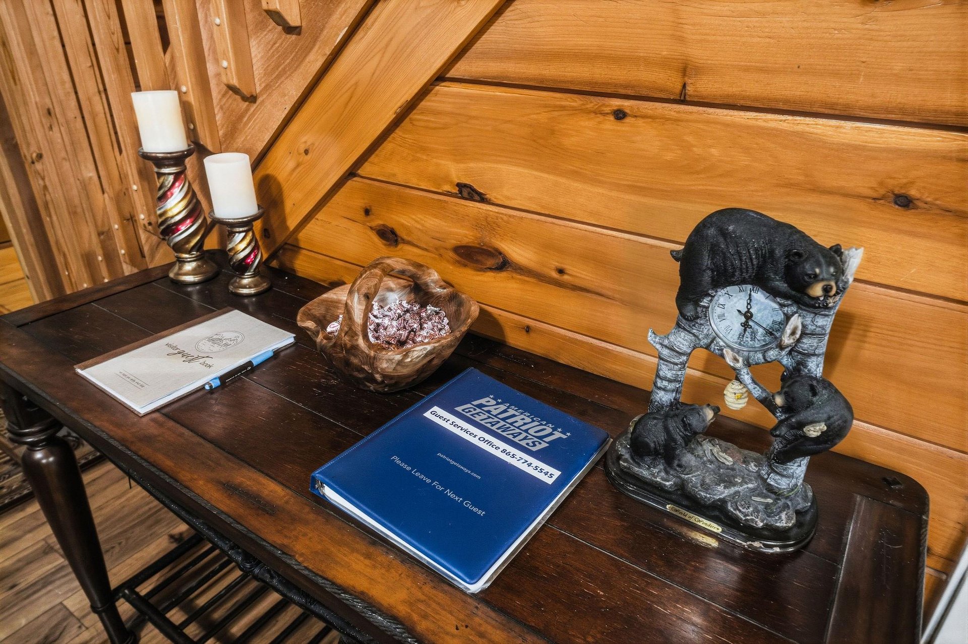Settle in at your cozy cabin retreat, where rustic wood paneling and thoughtful touches create a warm, mountaininspired welcome.