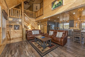Leather sofa and loveseat in the living room at Everlys Splash, a 4 bedroom cabin rental located in Pigeon Forge