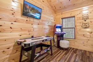 Arcade game and air hockey table