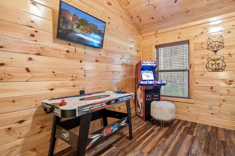 Arcade game and air hockey table