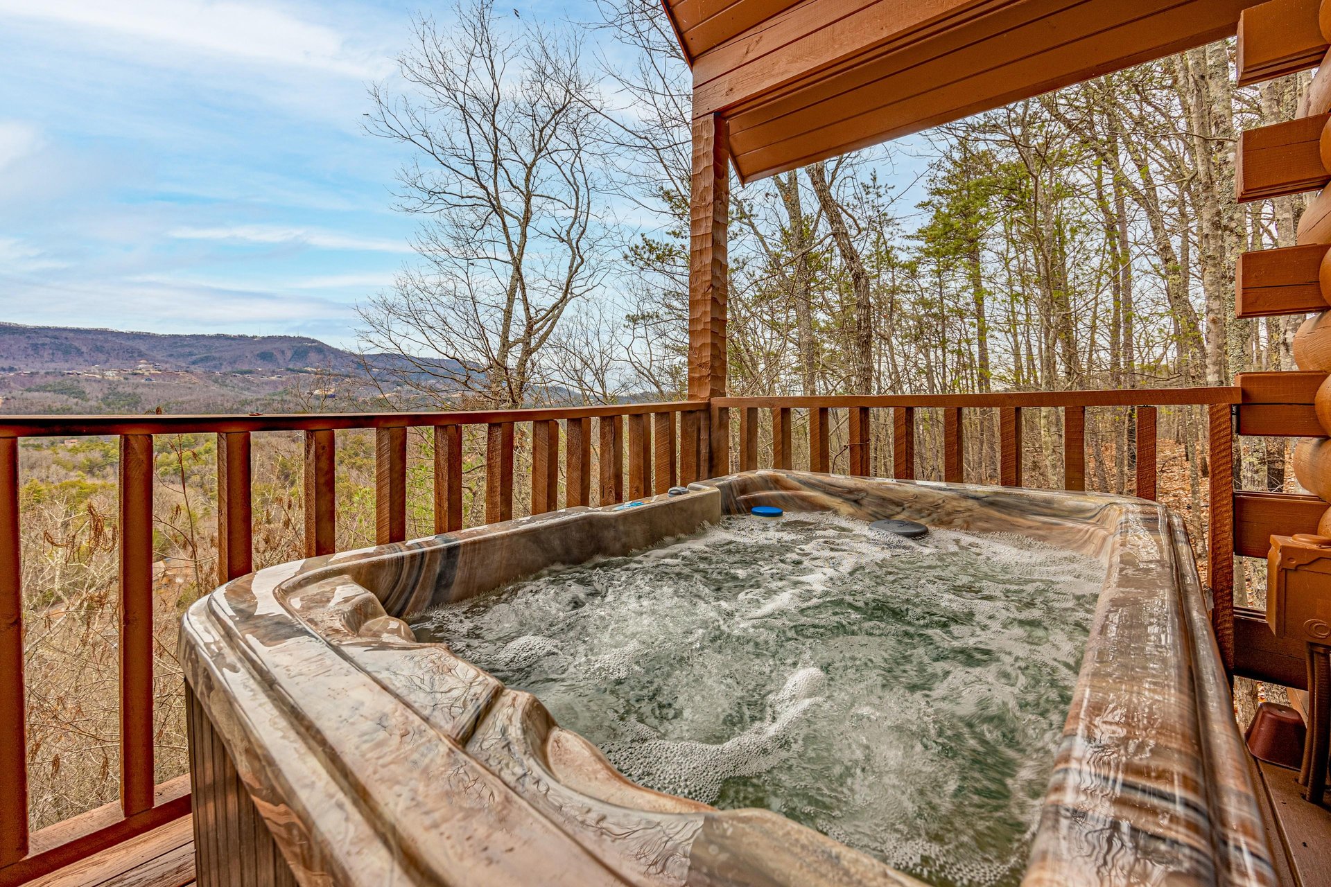 Hot tub at Cupids Crossing, a 1 bedroom cabin rental located in Pigeon Forge