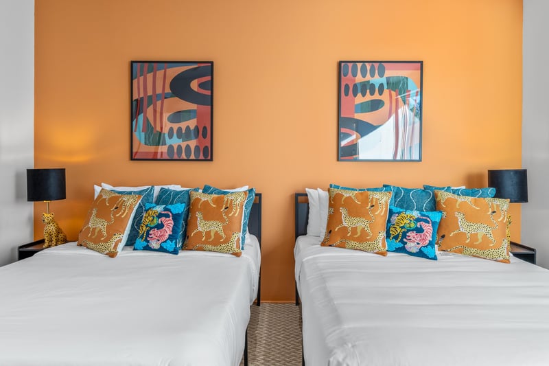 Guest bedroom with two full beds