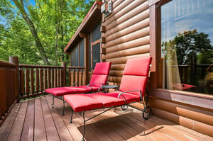 Stretch out on your private deck and let the forest canopy surround you. Two plush loungers invite you to soak in the sunshine and unwind completely in natures embrace.