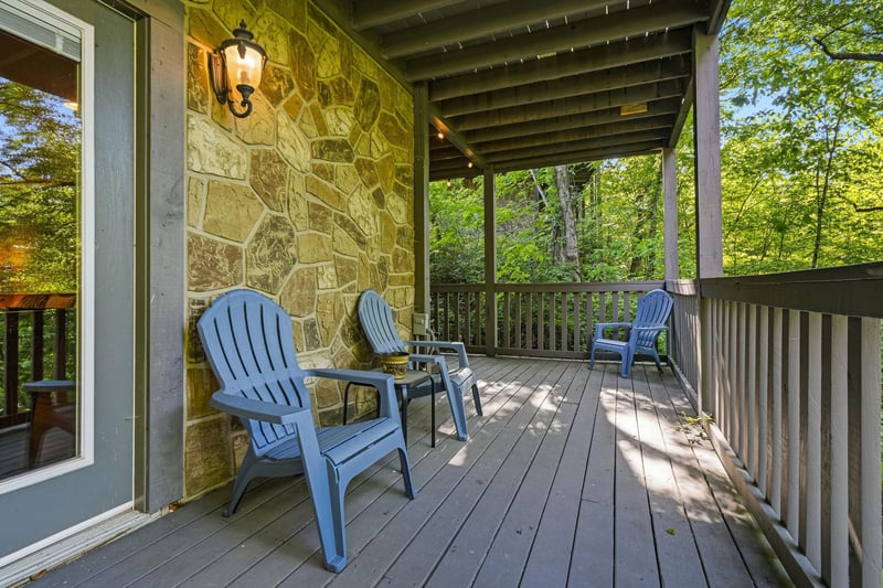 Relax in your private Adirondack chairs on the covered deck, surrounded by lush forest views.