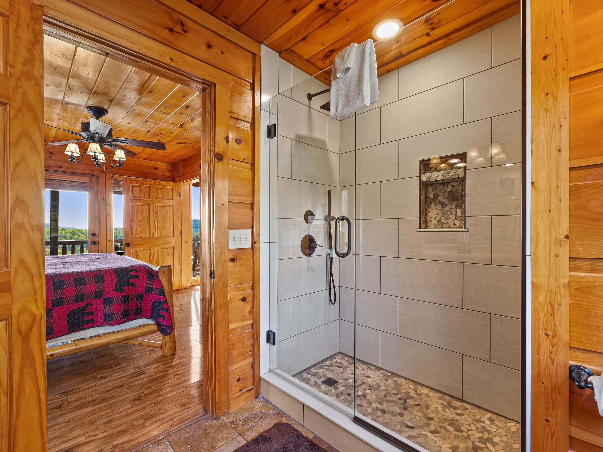 Walk in shower with tile walls