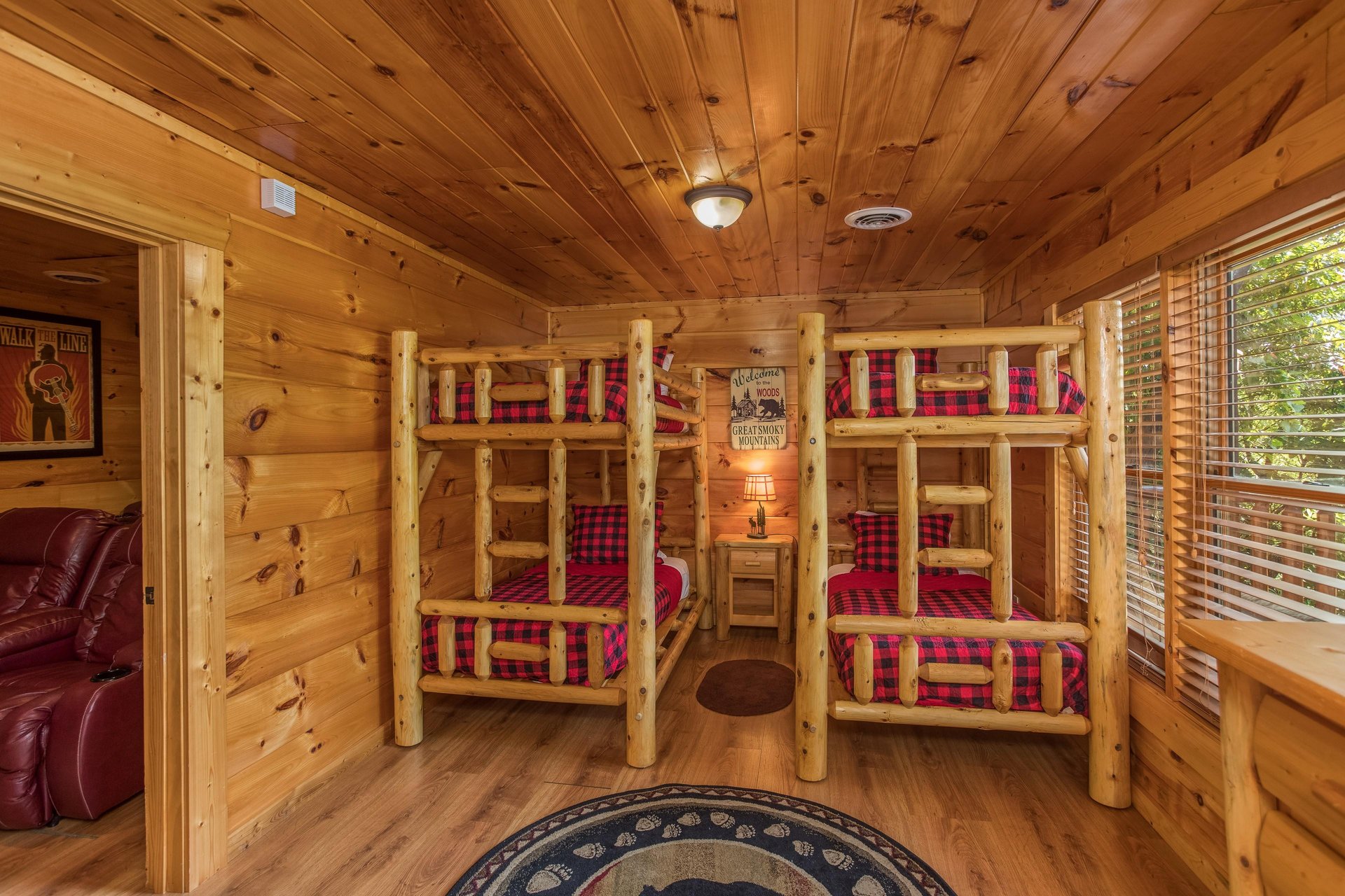 Bedroom with two sets of bunk beds at Graceland, a 4bedroom cabin rental located in Pigeon Forge