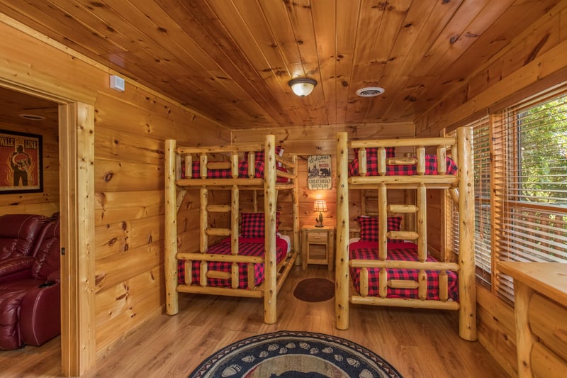 Bedroom with two sets of bunk beds at Graceland, a 4bedroom cabin rental located in Pigeon Forge
