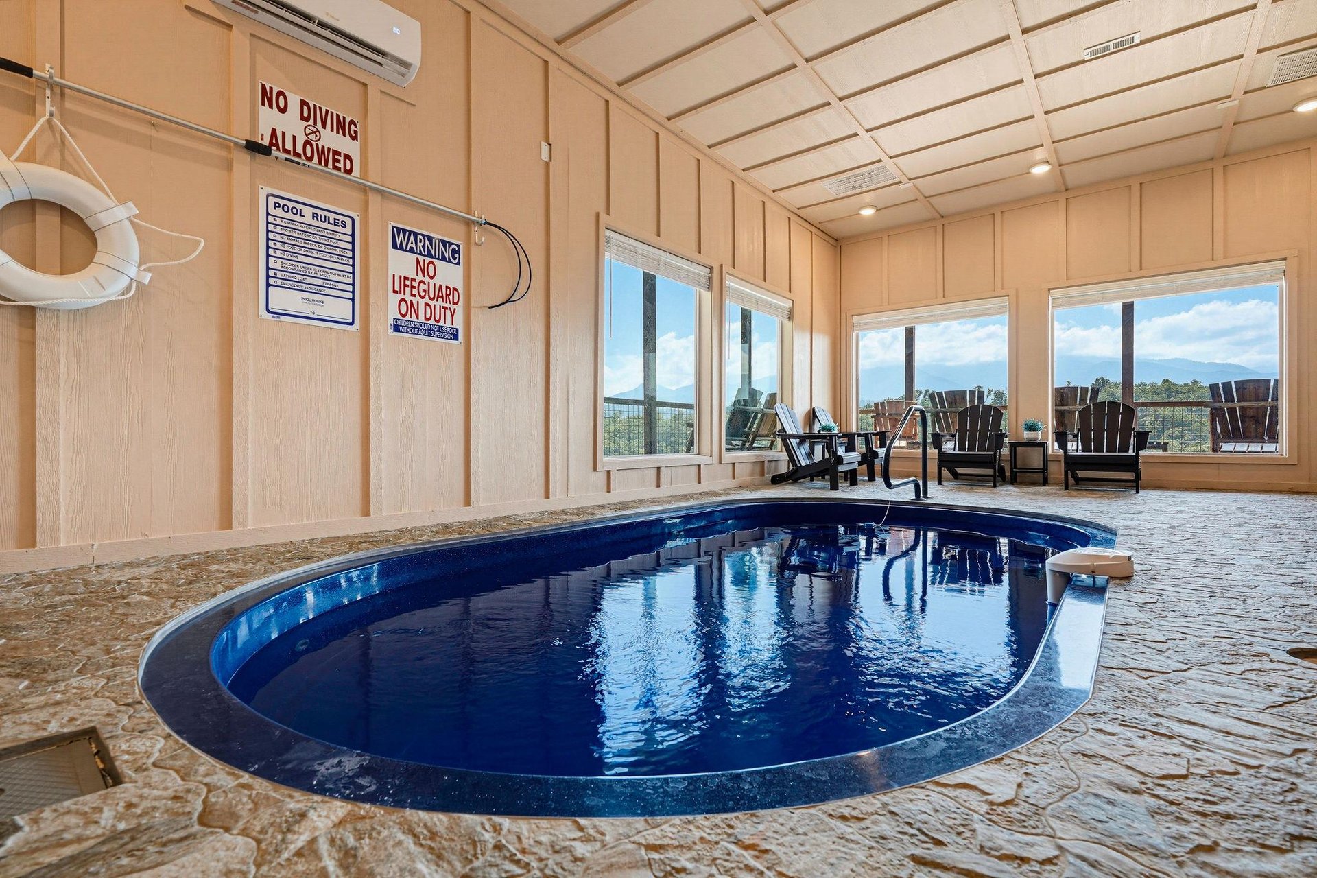 Your private indoor pool awaits, complete with lounging space and natural light streaming through the windows. Dive in anytime—this exclusive retreat is all yours.