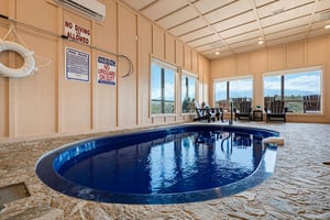 Your private indoor pool awaits, complete with lounging space and natural light streaming through the windows. Dive in anytime—this exclusive retreat is all yours.