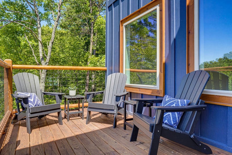 Unwind on your private deck with Adirondack chairs and forest views—perfect for morning coffee or evening relaxation surrounded by nature.