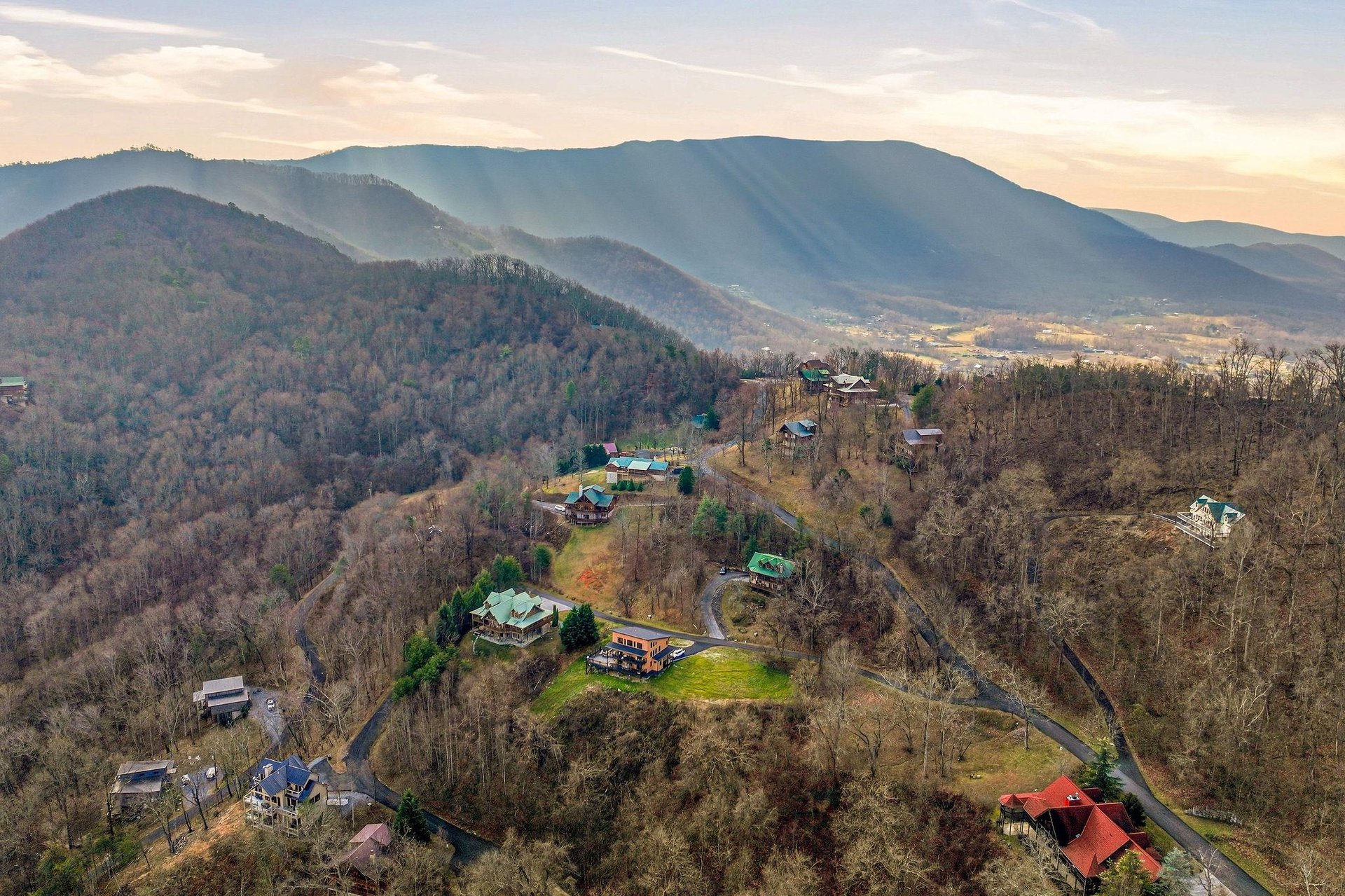 Majestic mountain views frame this peaceful hillside community, showcasing the stunning natural landscape surrounding the area.