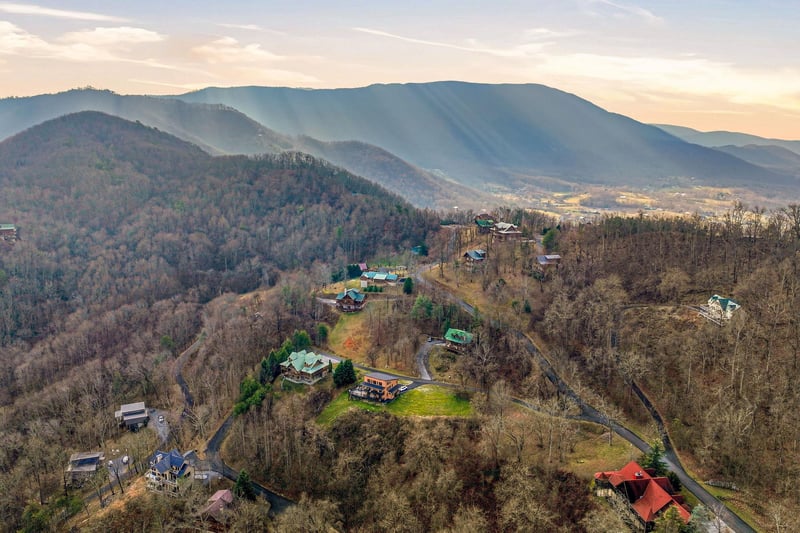 Majestic mountain views frame this peaceful hillside community, showcasing the stunning natural landscape surrounding the area.