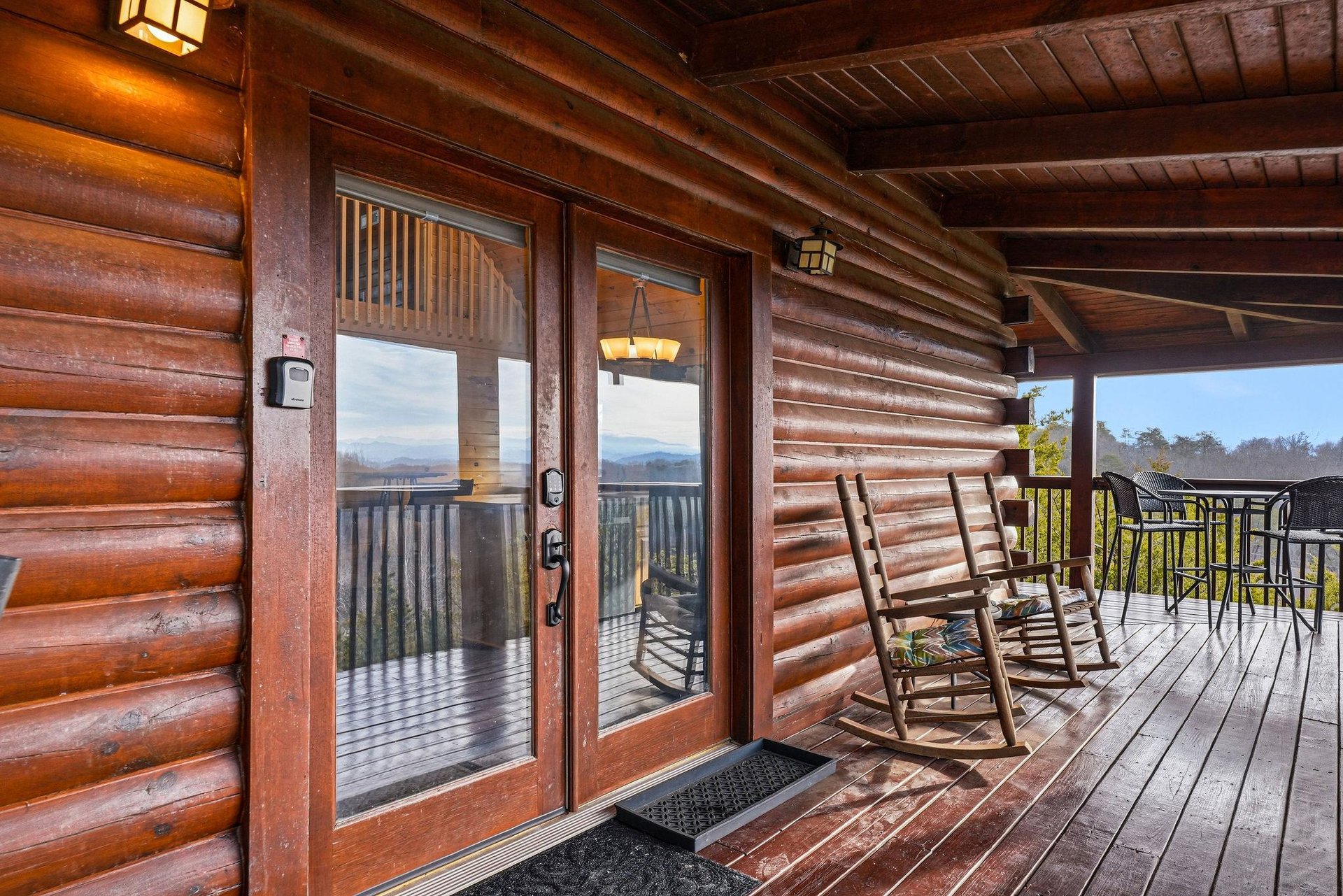 Unwind in your private rocking chair on this expansive deck, where mountain vistas stretch endlessly before you.