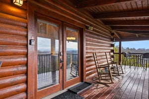 Unwind in your private rocking chair on this expansive deck, where mountain vistas stretch endlessly before you.