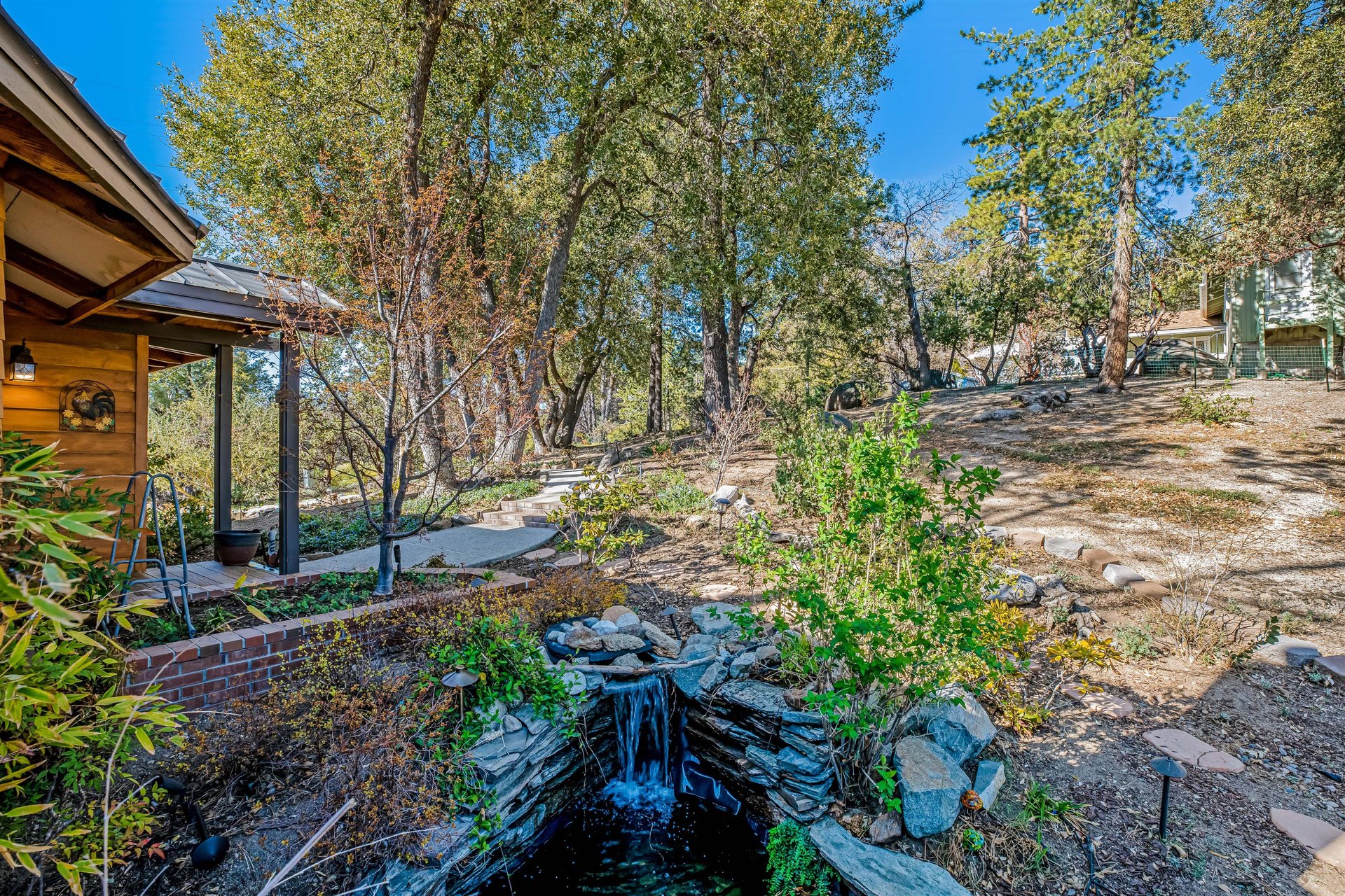 Enjoy the koi pond with two waterfalls located just off the back deck.