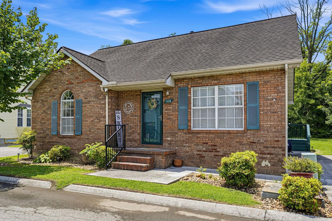 A charming brick home with inviting curb appeal awaits your arrival. Classic architectural details and lush landscaping create a welcoming atmosphere from the moment you arrive.