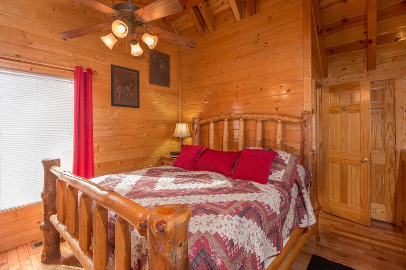 Bedroom with a log bed at Country Bears Getaway, a 3bedroom cabin rental located in Gatlinburg