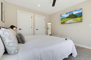 Sink into crisp linens and unwind in your peaceful retreat, where soft tones and thoughtful touches invite restful nights.