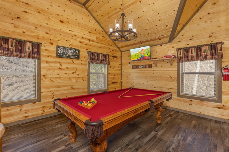 Pool table in the loft at Everlys Splash, a 4 bedroom cabin rental located in Pigeon Forge