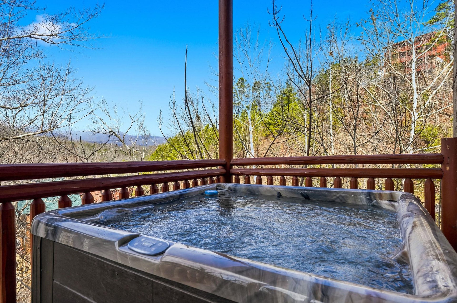 Soak in bubbling waters while mountain vistas unfold before you—your private hot tub offers the perfect blend of relaxation and scenic beauty.