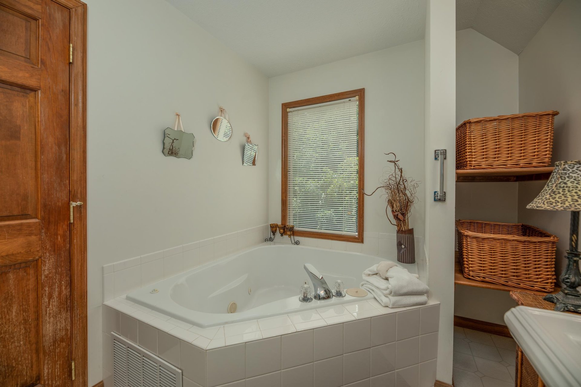 Corner jacuzzi tub at Amazing Memories, a 3 bedroom cabin rental located in Pigeon Forge