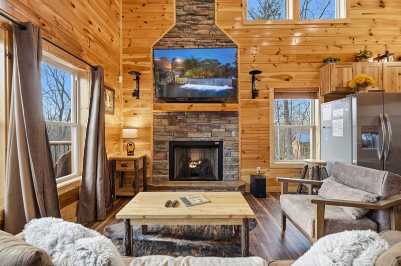 Gather around your cozy stone fireplace where warm wood surrounds you and soft throws invite relaxation after mountain adventures.
