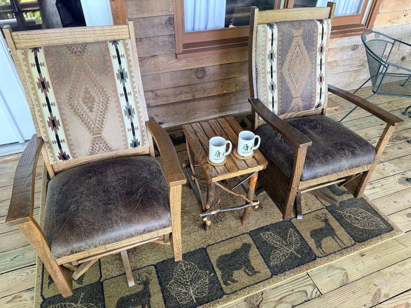Settle into these charming handcrafted chairs and enjoy your morning coffee with rustic mountain elegance. The Southwestinspired upholstery and warm wood create an inviting spot for relaxation.