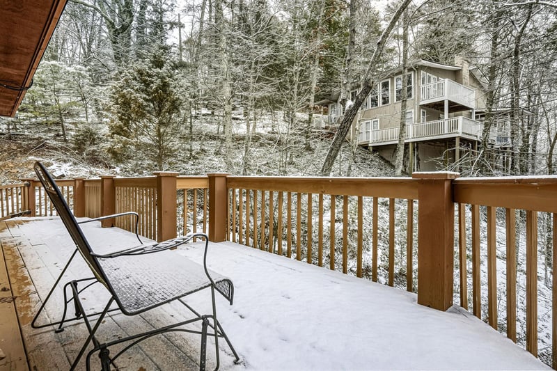 Step onto your private deck and breathe in the crisp winter air while gazing at snowdusted trees.