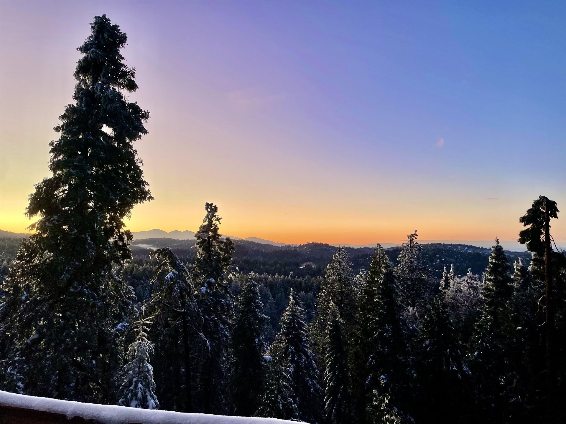 Stunning mountain and treetop views can be seen from the deck.