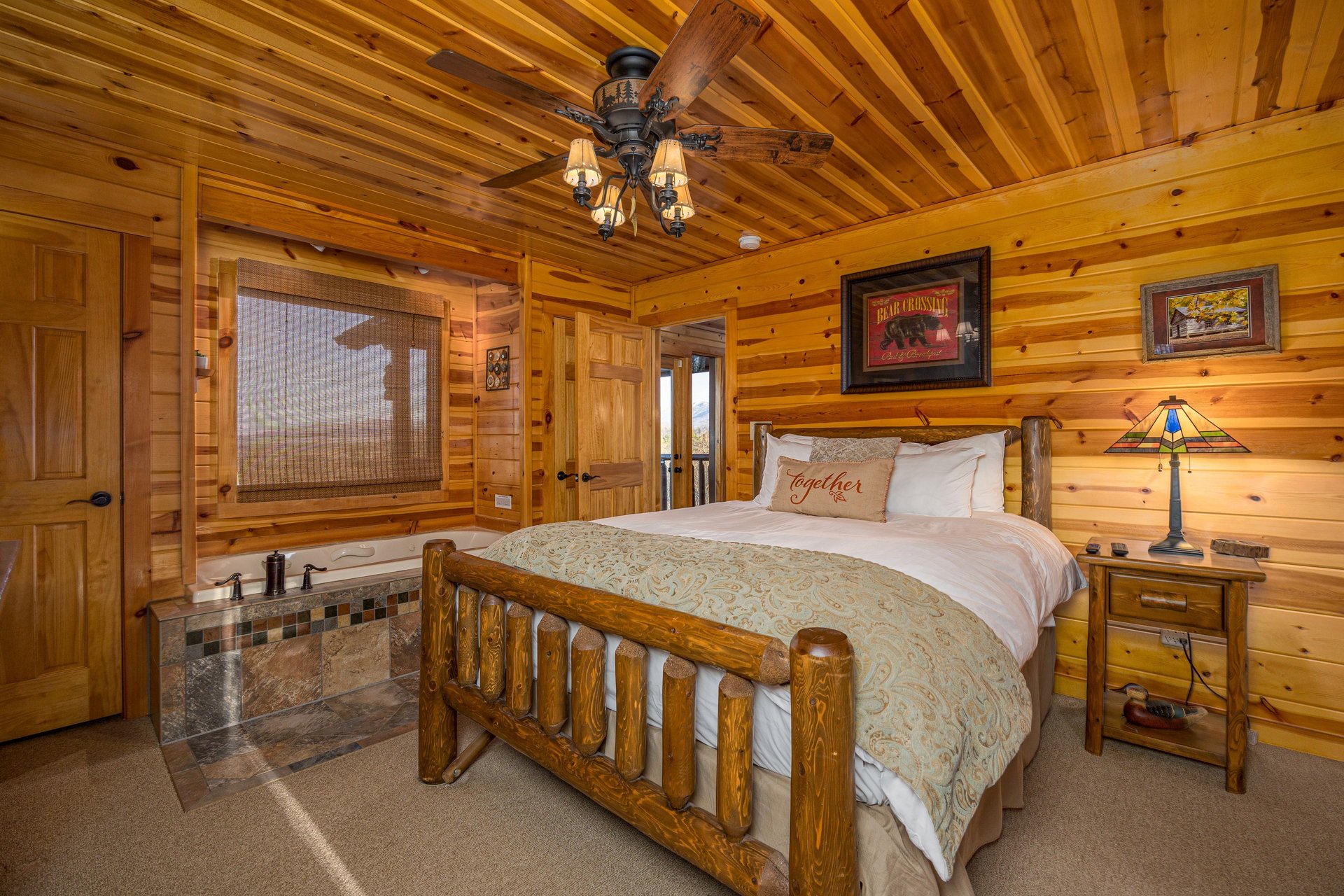 Jacuzzi beside queen bed
