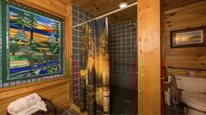 Walk in shower and stained glass window