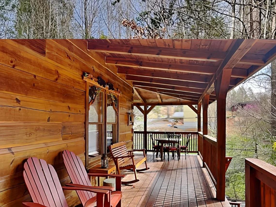 Picture yourself unwinding on this cozy covered deck, surrounded by warm wood tones and peaceful wooded views, with plenty of space for morning coffee or evening meals under the open beams.