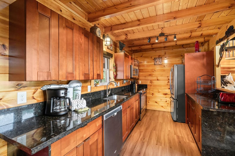 full kitchen with appliances and cabinets