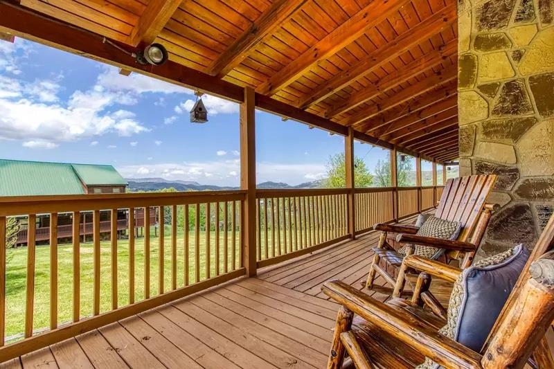 Settle into your favorite rocker on the covered porch and drink in panoramic mountain views—perfect for sipping morning coffee or watching the day unwind.