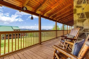 Settle into your favorite rocker on the covered porch and drink in panoramic mountain views—perfect for sipping morning coffee or watching the day unwind.